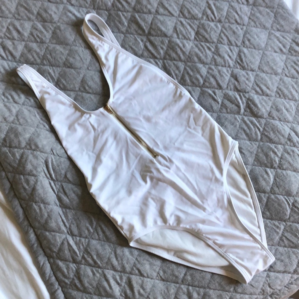 NWOT One-piece with zip front / backless